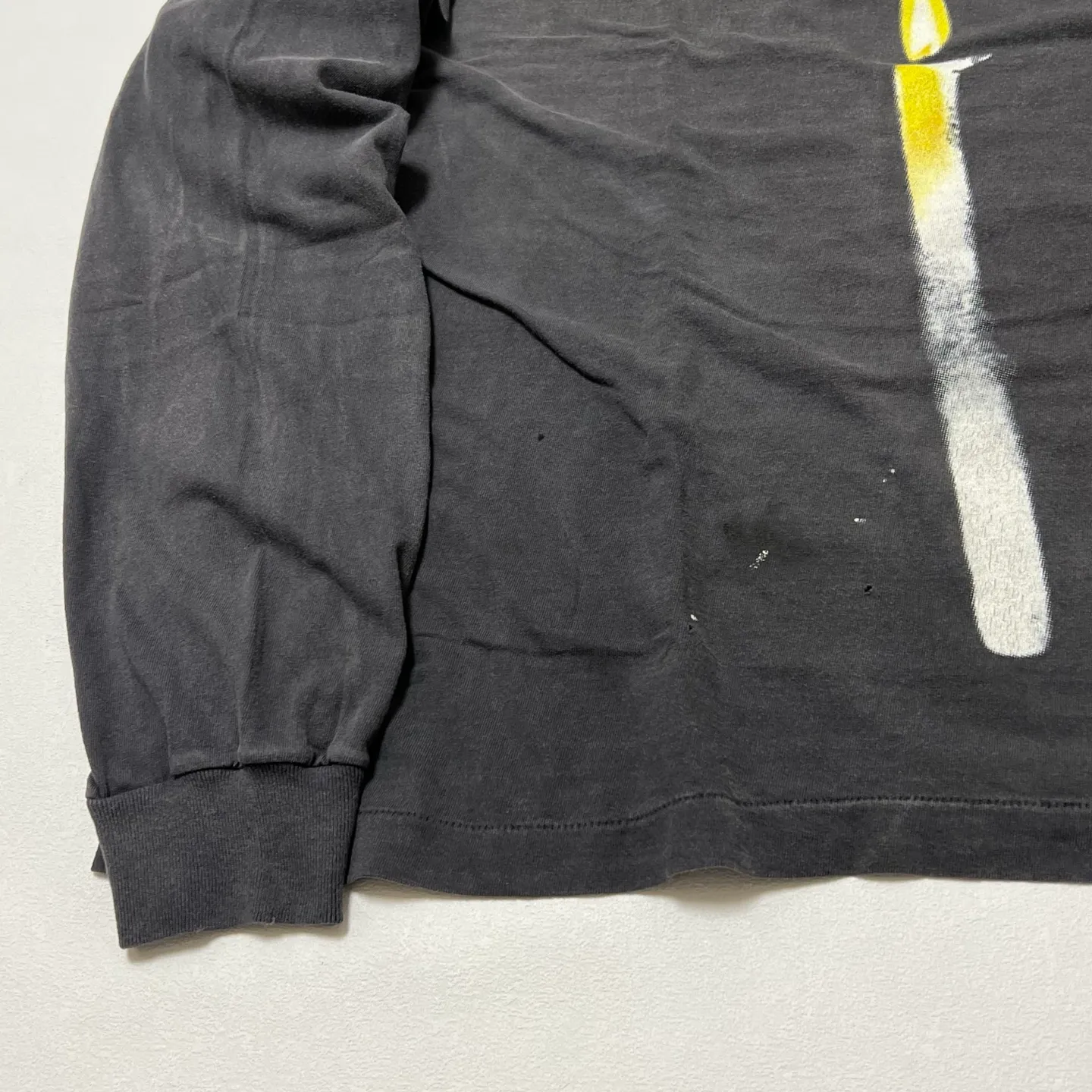 SAINT Mxxxxxx CANDLE LS TEE/BLK Slogan candle distressed long-sleeved TEE with angel short sleeves on the back. Washed black S-XL. Same as the original. Cylindrical side seam OE yarn fabric. Garment dyeing. Faded by heavy washing. Faded by plaster on bust. Correct alignment. Original consistent main mark/wash mark/cherub anti-counterfeiting mark. Original level printing restoration.